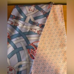 Hermes’ Silk Maxi Twilly scarf.  Purple and assorted colours.